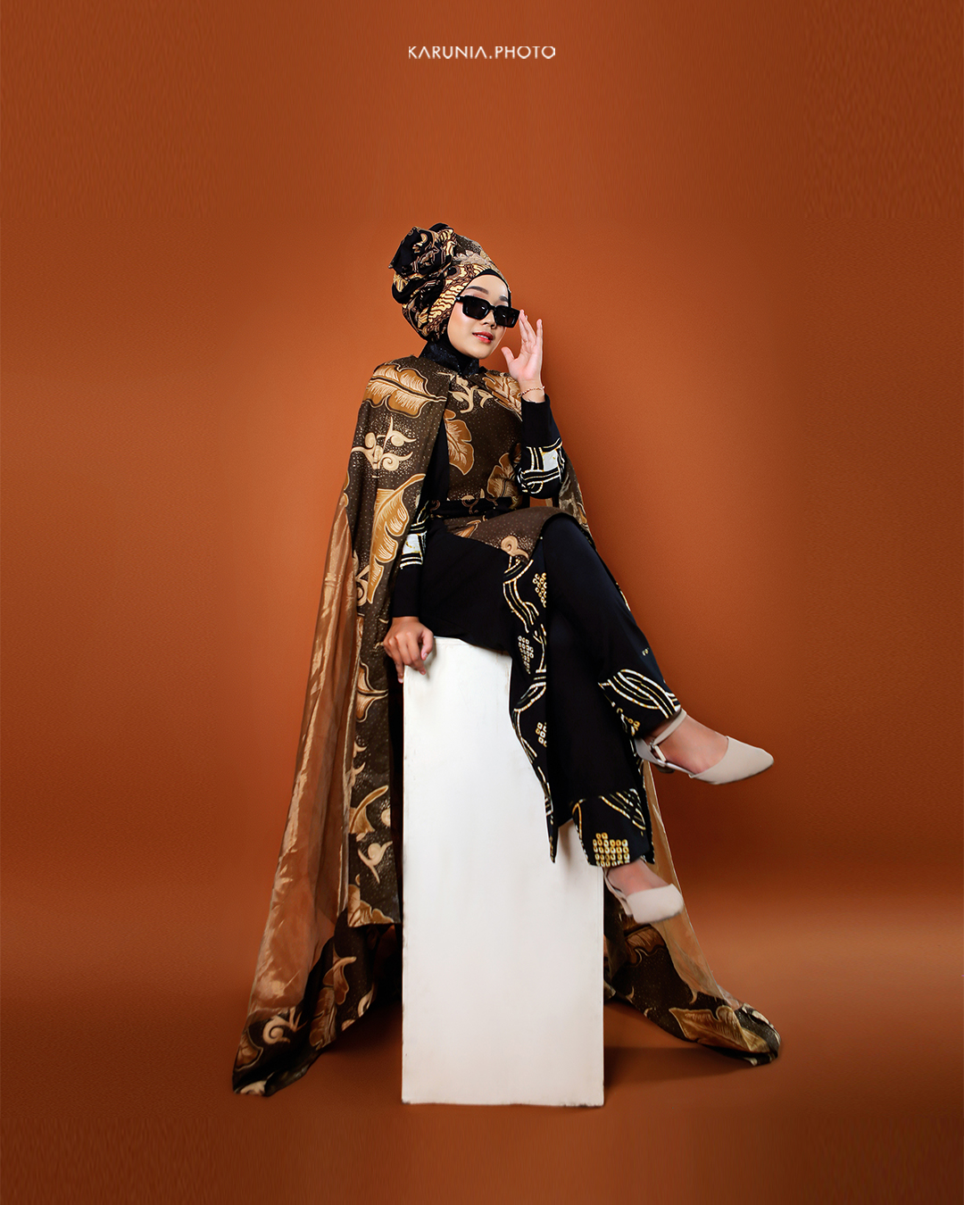 Artistic portrait with creative lighting effects casting geometric shadows across the subject's face